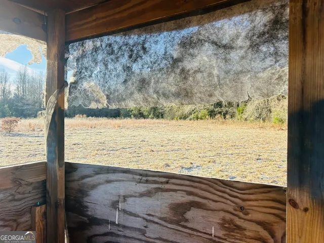 a view of a yard covered with snow