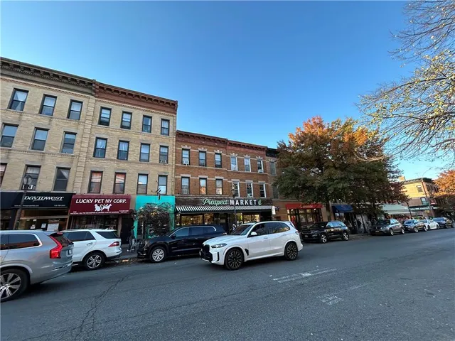 a car parked in front of a building