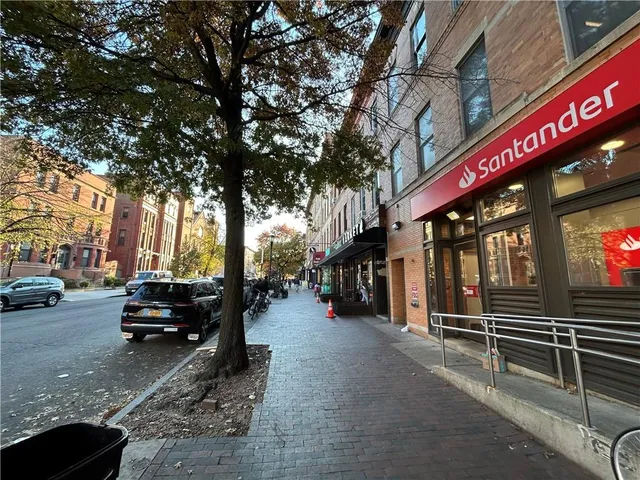 a view of a street with cars