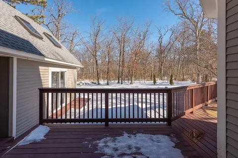a porch with wooden floor