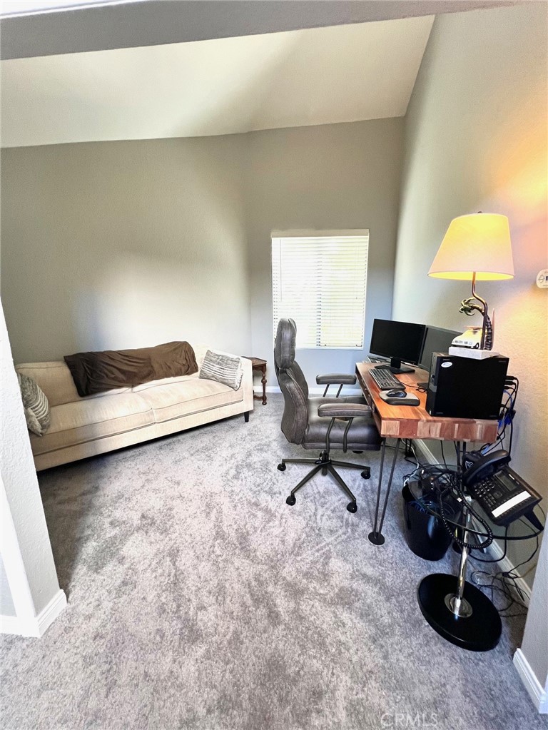 16083 Crete Lane Huntington Beach, CA 92649 - Photo 12 of 22 a living room with furniture and a window