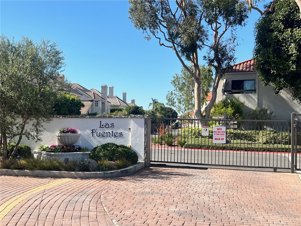 16083 Crete Lane Huntington Beach, CA 92649 - Photo 22 of 22 a view of a house with a small yard and plants