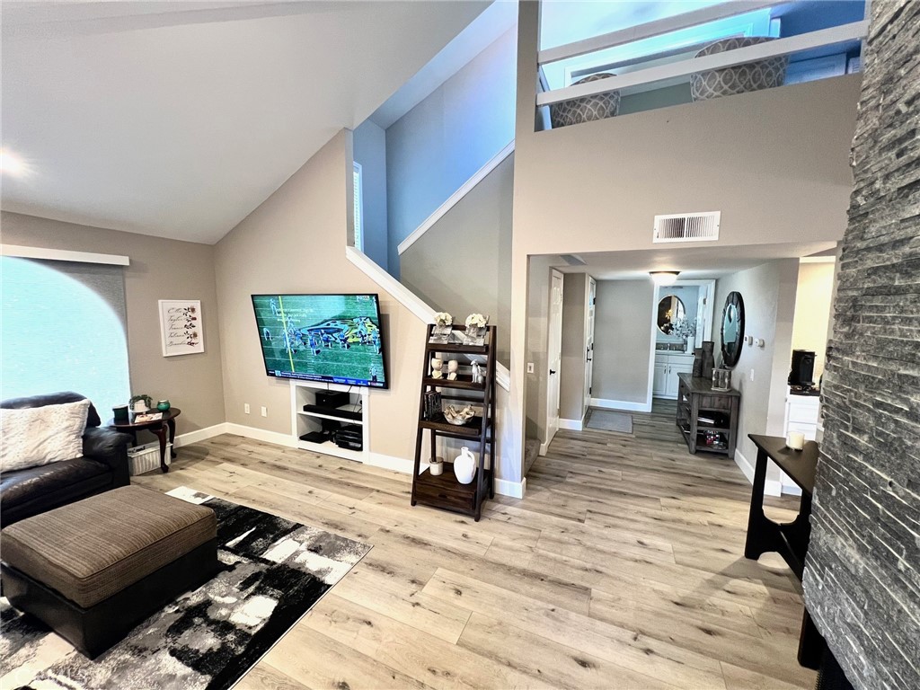 16083 Crete Lane Huntington Beach, CA 92649 - Photo 5 of 22 a living room with furniture and a flat screen tv