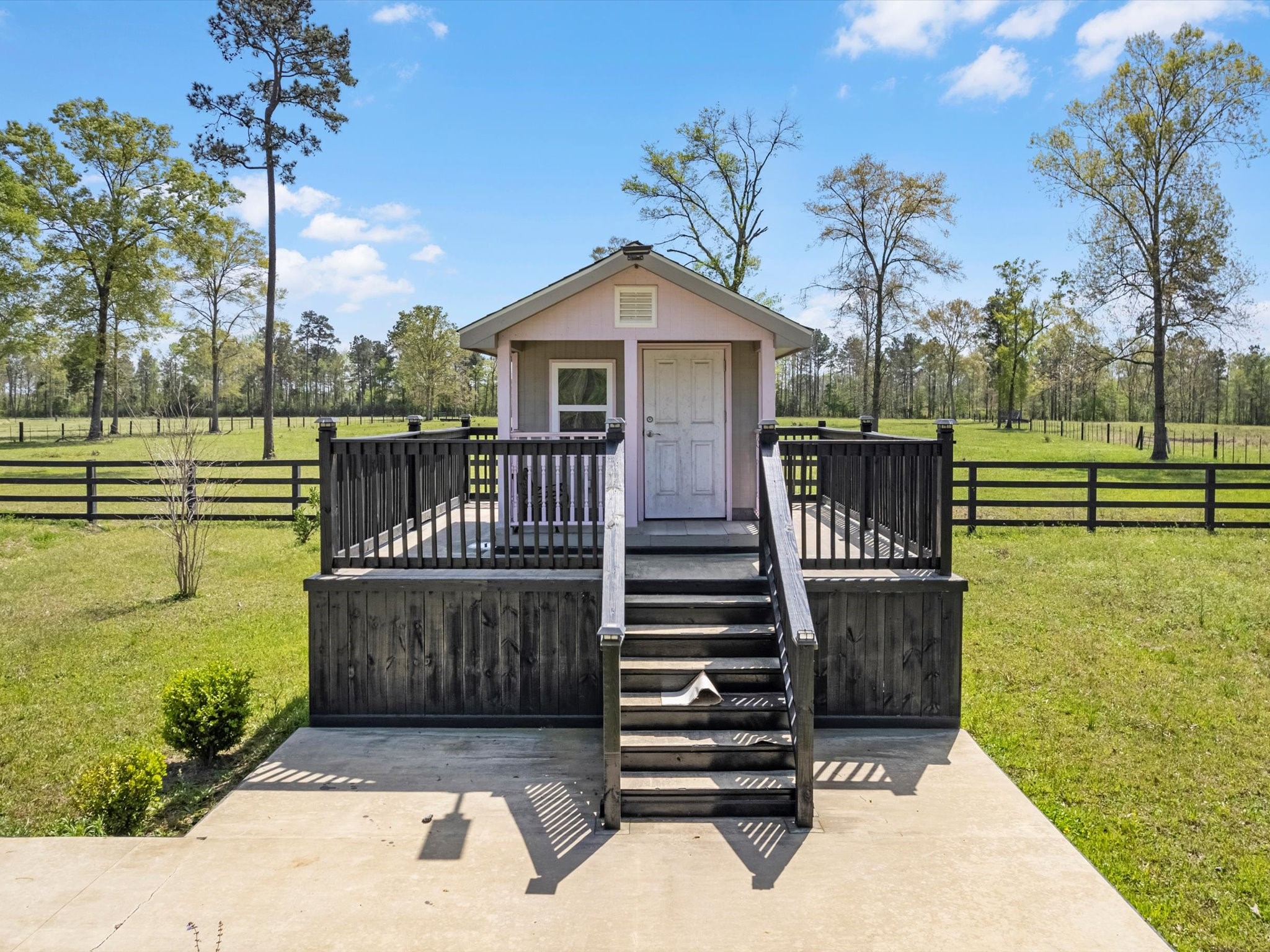 1164 County Road 332 Cleveland, TX 77327 - Photo 13 of 24 a view of a deck with a yard