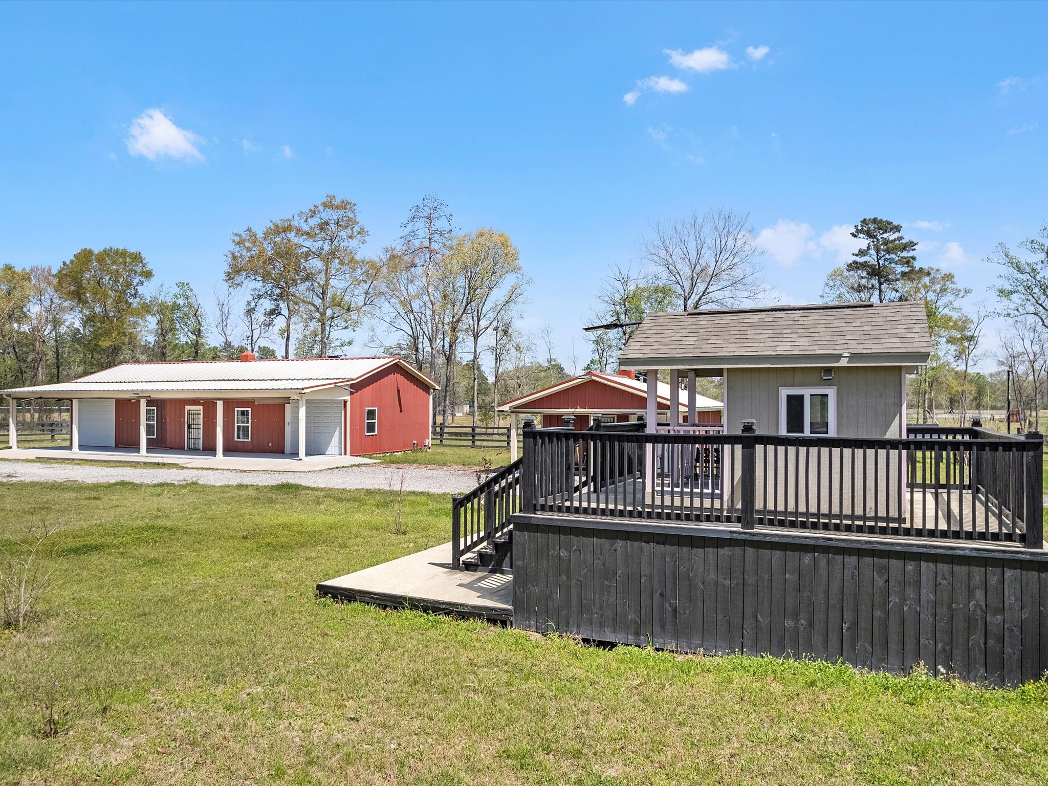 1164 County Road 332 Cleveland, TX 77327 - Photo 14 of 24 a view of a house with a yard balcony and furniture