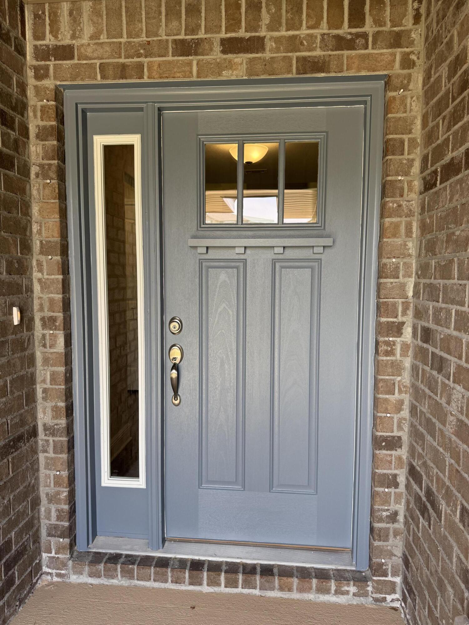 194 Ridgeway Circle Crestview, FL 32536 - Photo 3 of 25 a view of wooden door