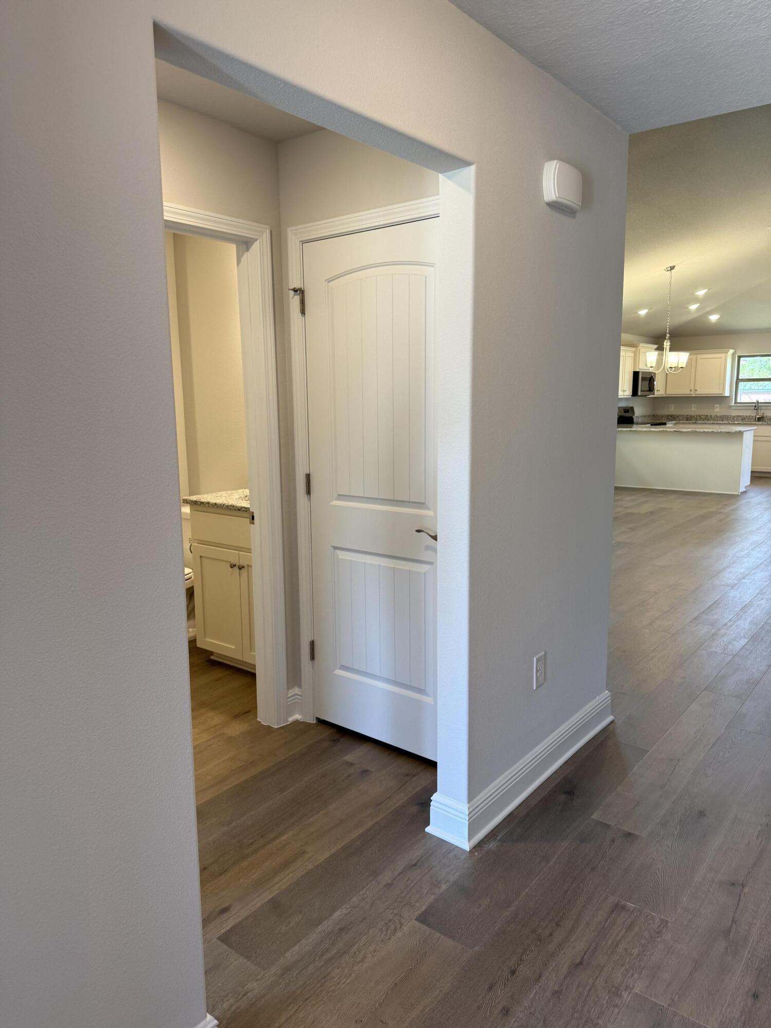 194 Ridgeway Circle Crestview, FL 32536 - Photo 5 of 25 a view of a room with wooden floor