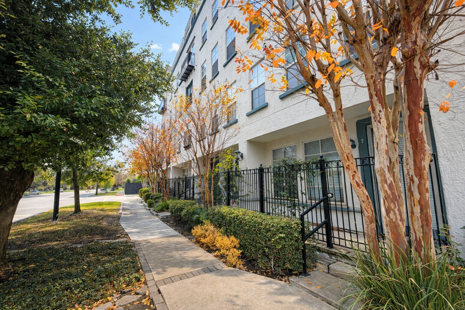 2216 Chenevert Street, Unit 6 Houston, TX 77003 - Photo 24 of 29 Tree-lined sidewalk and gated ground-level residences create a welcoming, walkable Midtown setting.