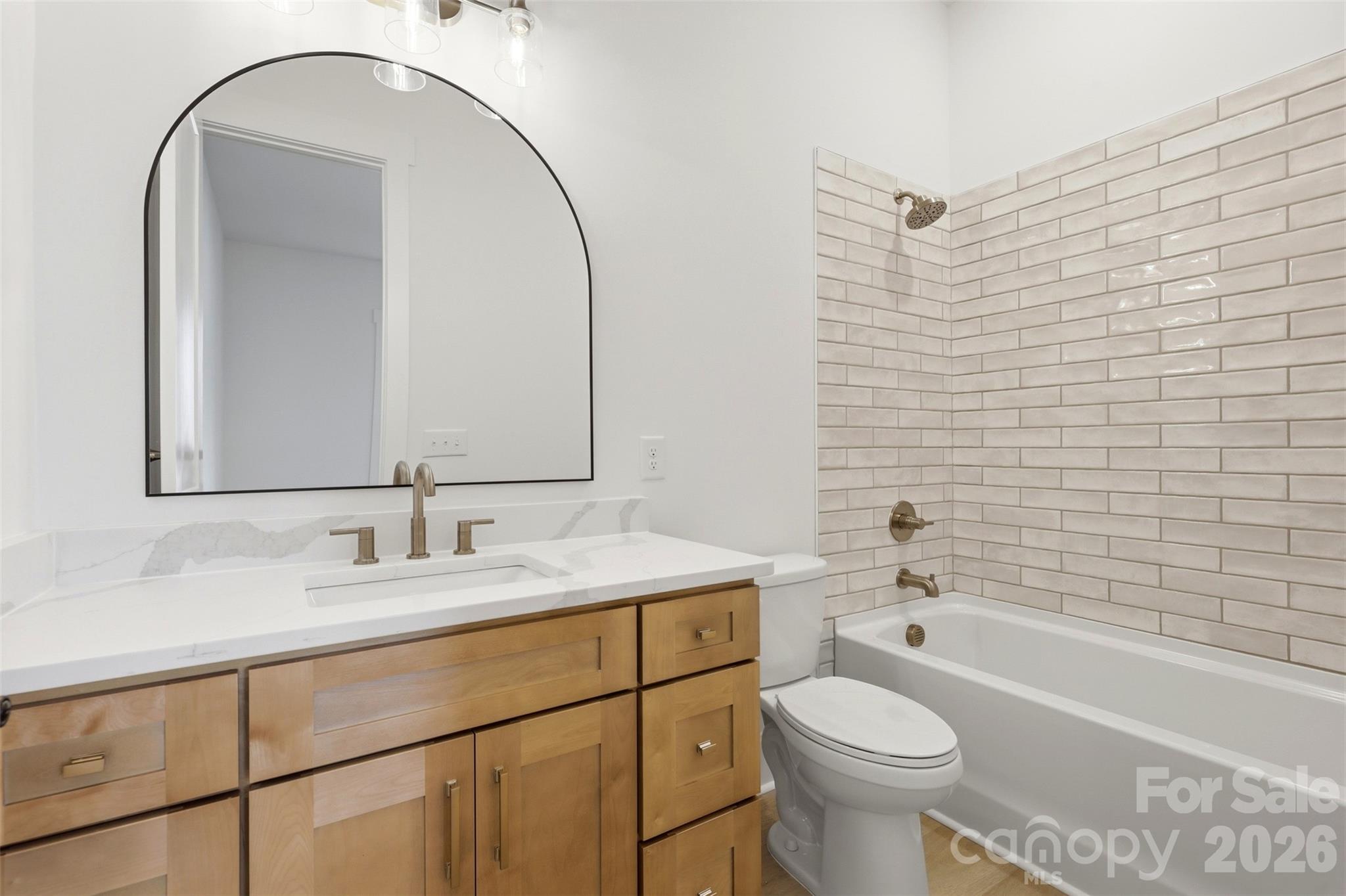 4734 Polk Ford Road Stanfield, NC 28163 - Photo 33 of 48 a bathroom with a sink and a mirror