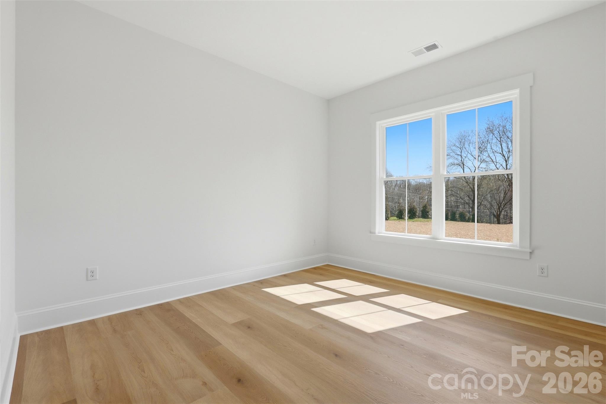 4734 Polk Ford Road Stanfield, NC 28163 - Photo 37 of 48 a view of empty room with window