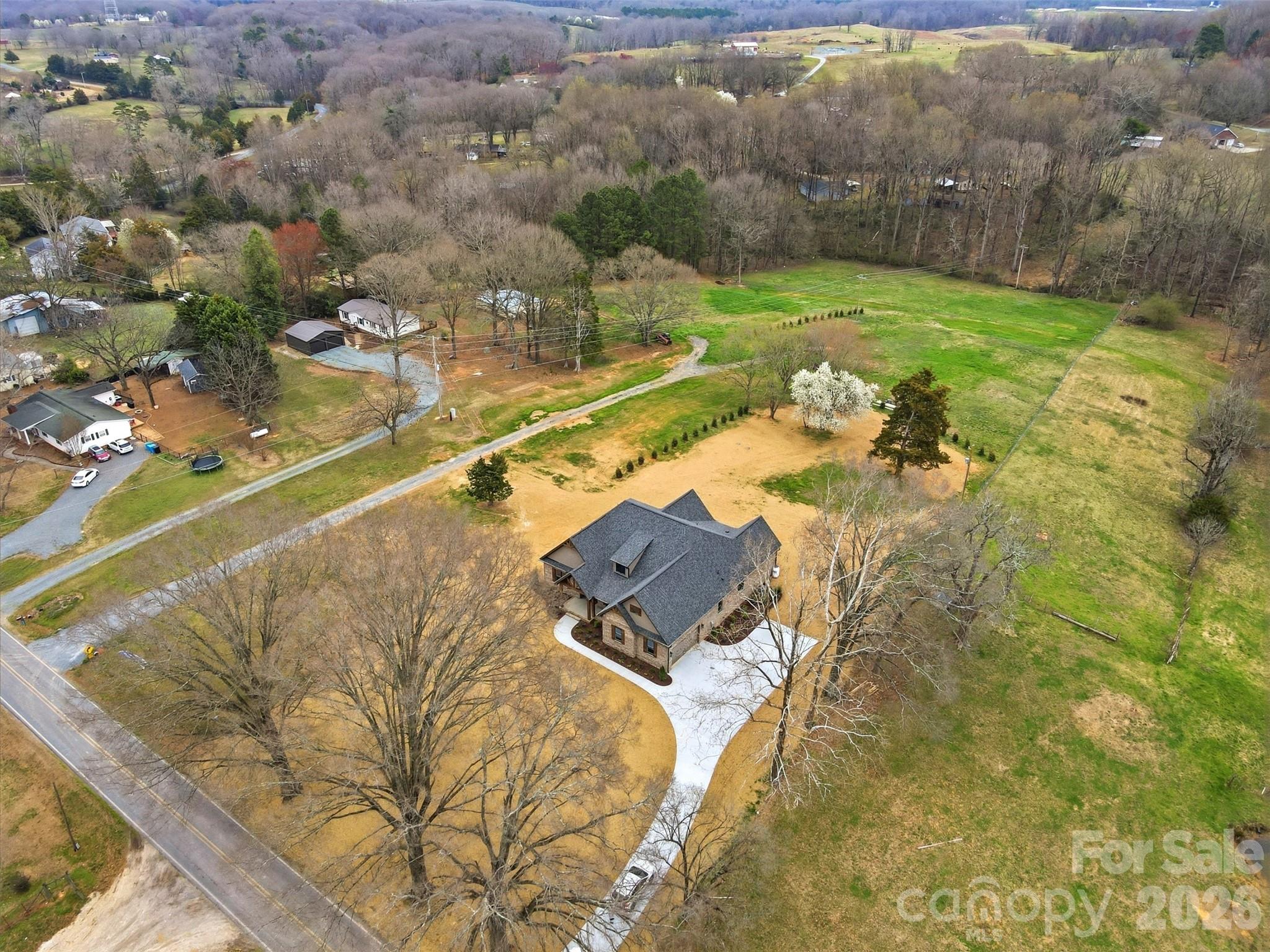 4734 Polk Ford Road Stanfield, NC 28163 - Photo 47 of 48 a view of a swimming pool with a yard