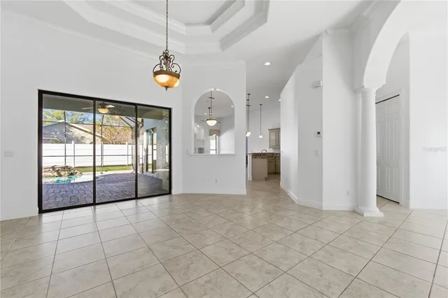 a view of a room with window and cabinet