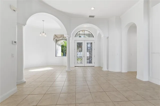 a view of entryway with kitchen