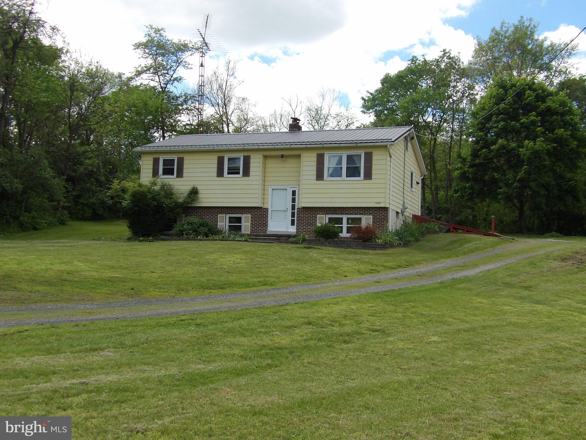 1045 Lockport Road Lewistown, PA 17044 - Photo 37 of 51 Charming split-level home on lush grounds.