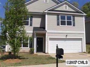 4420 Raku Court Charlotte, NC 28269 - Photo 1 of 1 a front view of a house with garage