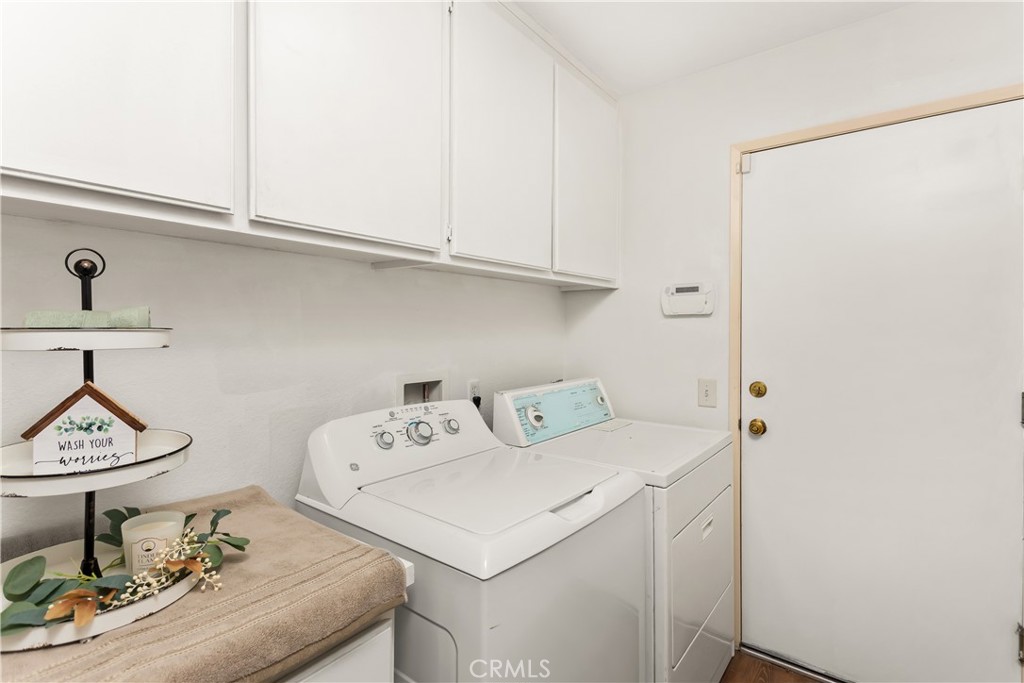 7693 Chanticleer Road Highland, CA 92346 - Photo 9 of 14 a utility room with dryer and washer