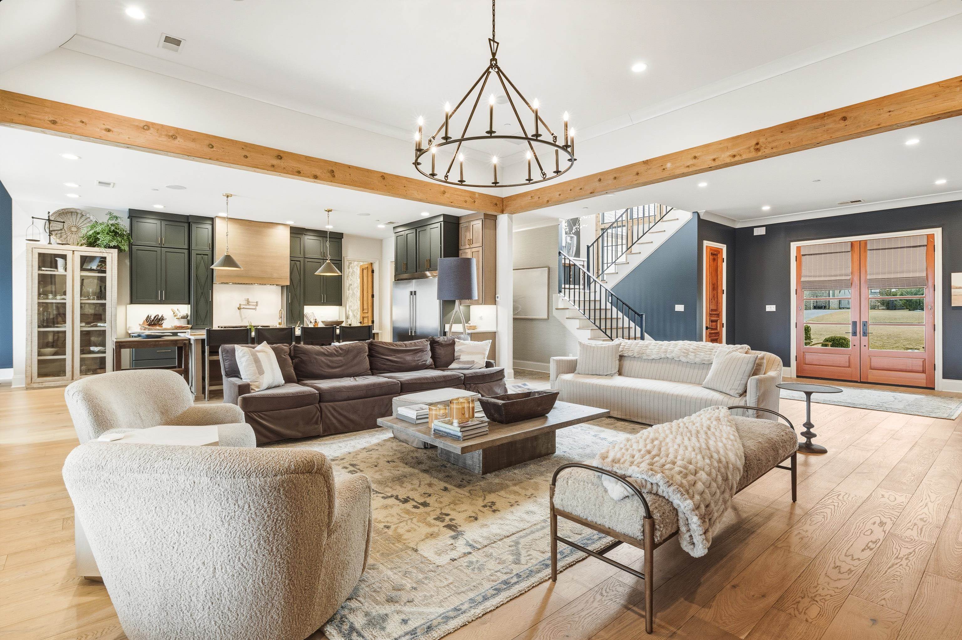 160 North Lake Road Piperton, TN 38017 - Photo 12 of 40 a living room with furniture a large window and a chandelier