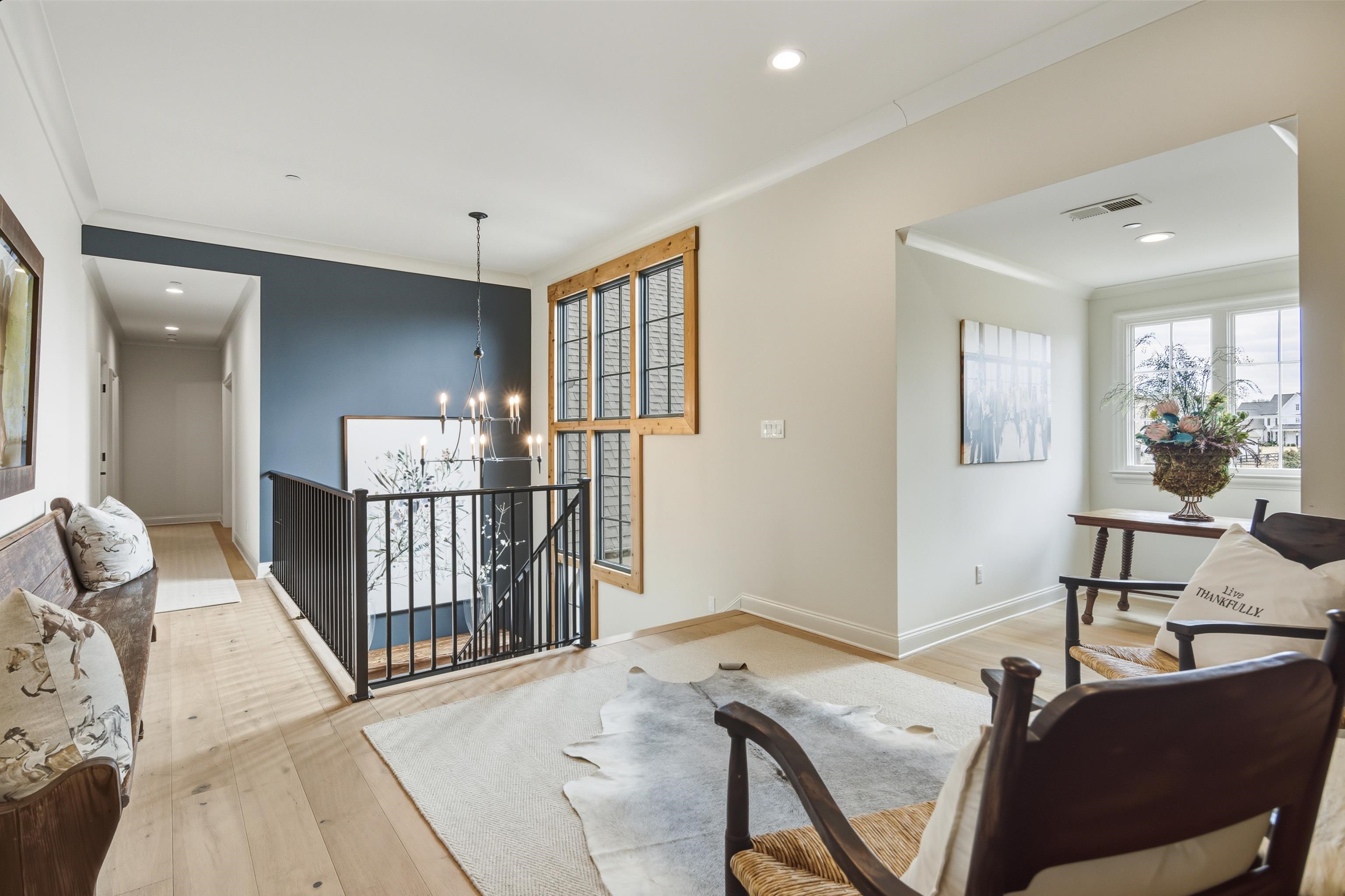 160 North Lake Road Piperton, TN 38017 - Photo 15 of 40 Living area with an upstairs landing, a chandelier, light wood-style floors, crown molding, and recessed lighting