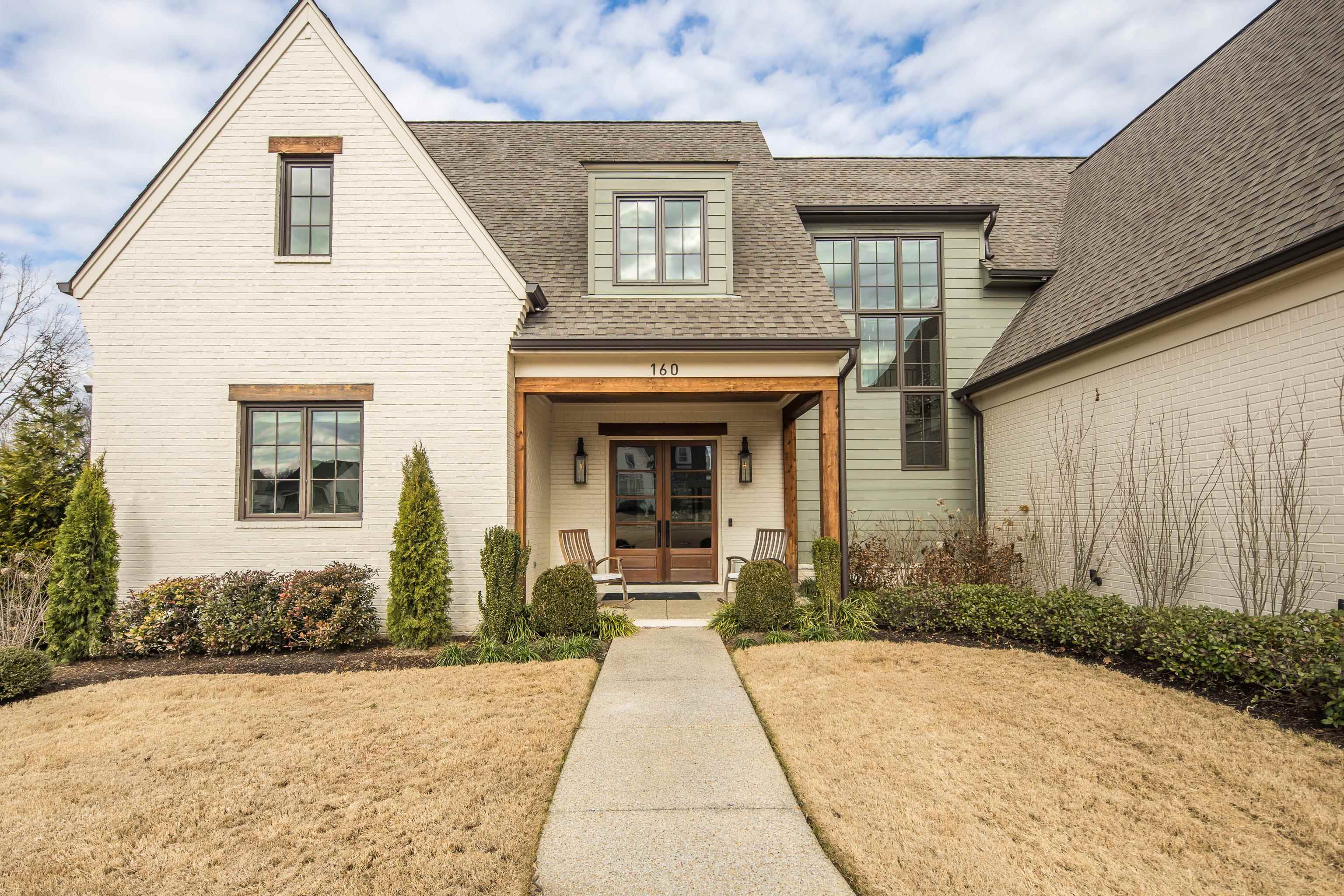160 North Lake Road Piperton, TN 38017 - Photo 3 of 40 a front view of a house with a yard