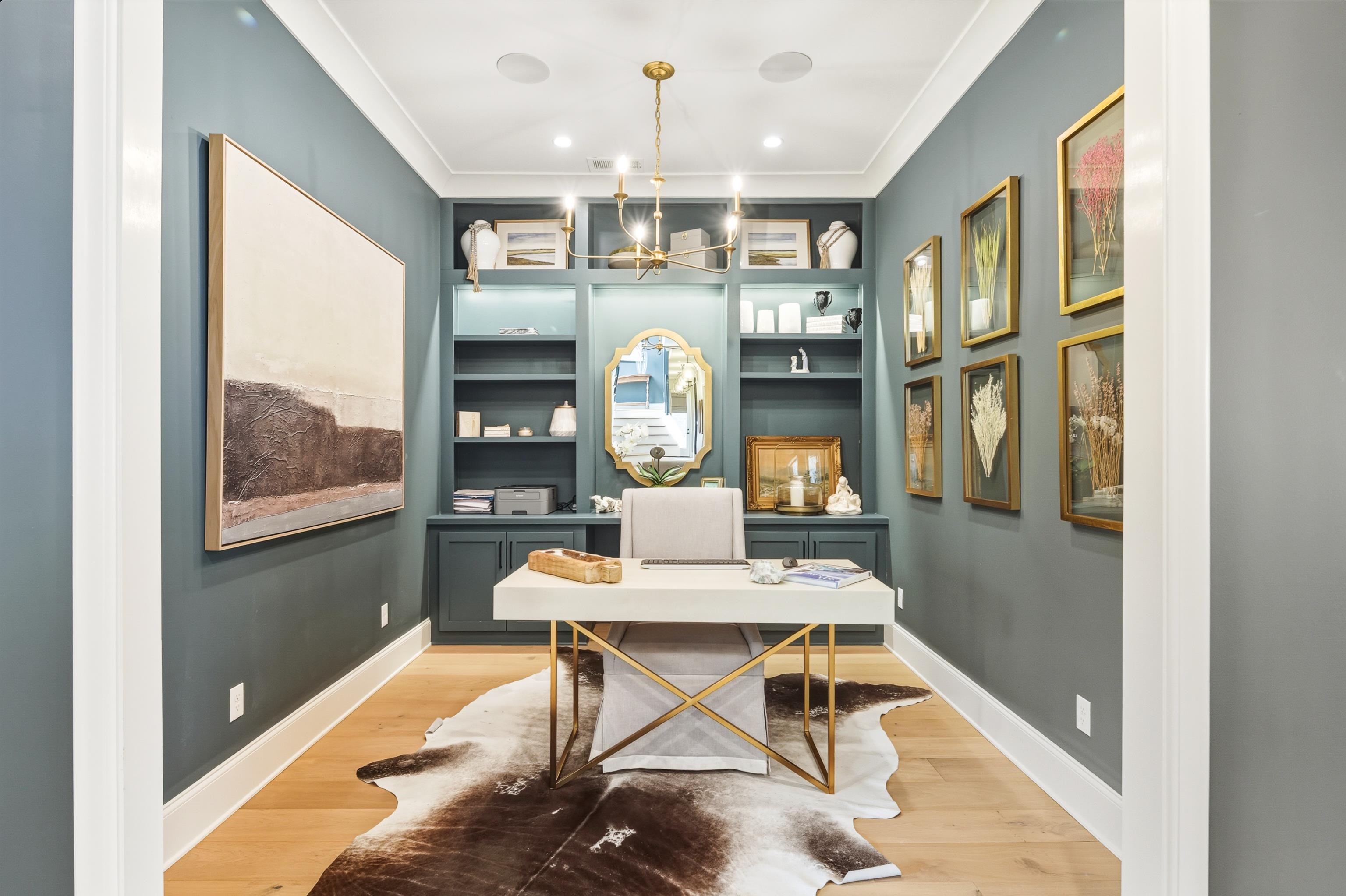 160 North Lake Road Piperton, TN 38017 - Photo 6 of 40 a view of a livingroom with furniture a chandelier and wooden floor