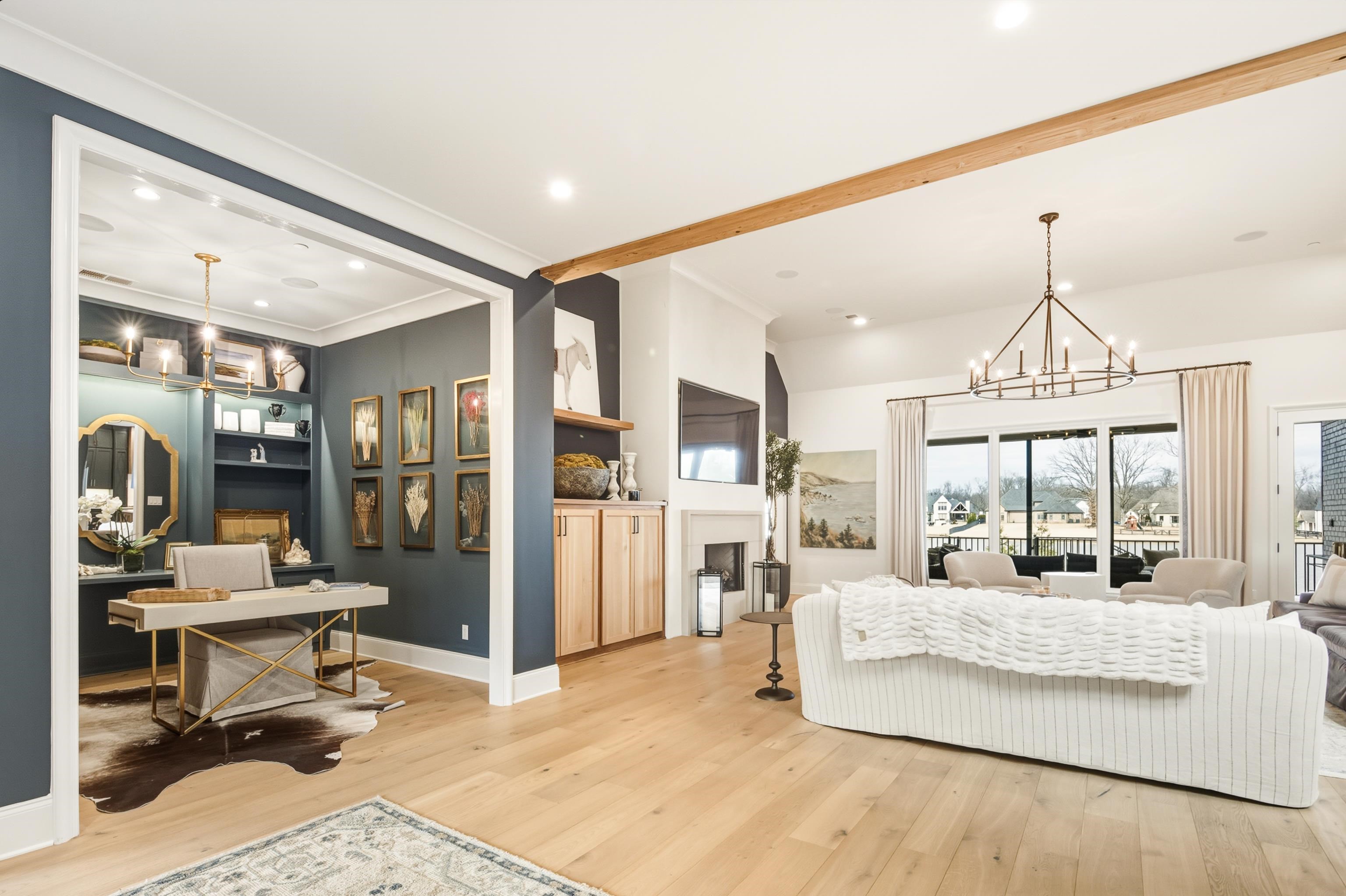 160 North Lake Road Piperton, TN 38017 - Photo 7 of 40 a living room with furniture and a chandelier