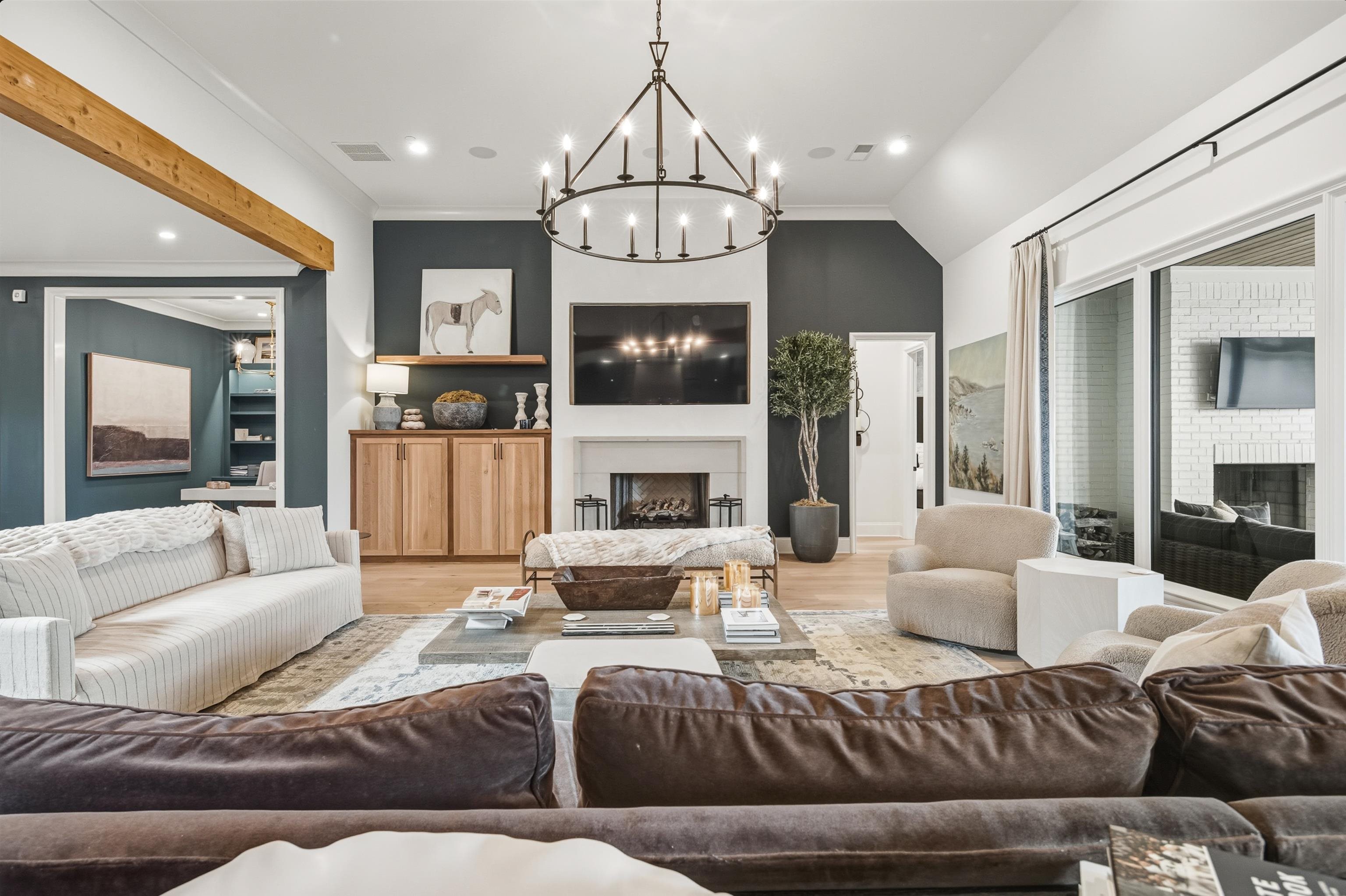 160 North Lake Road Piperton, TN 38017 - Photo 10 of 40 a living room with furniture a fireplace and a flat screen tv