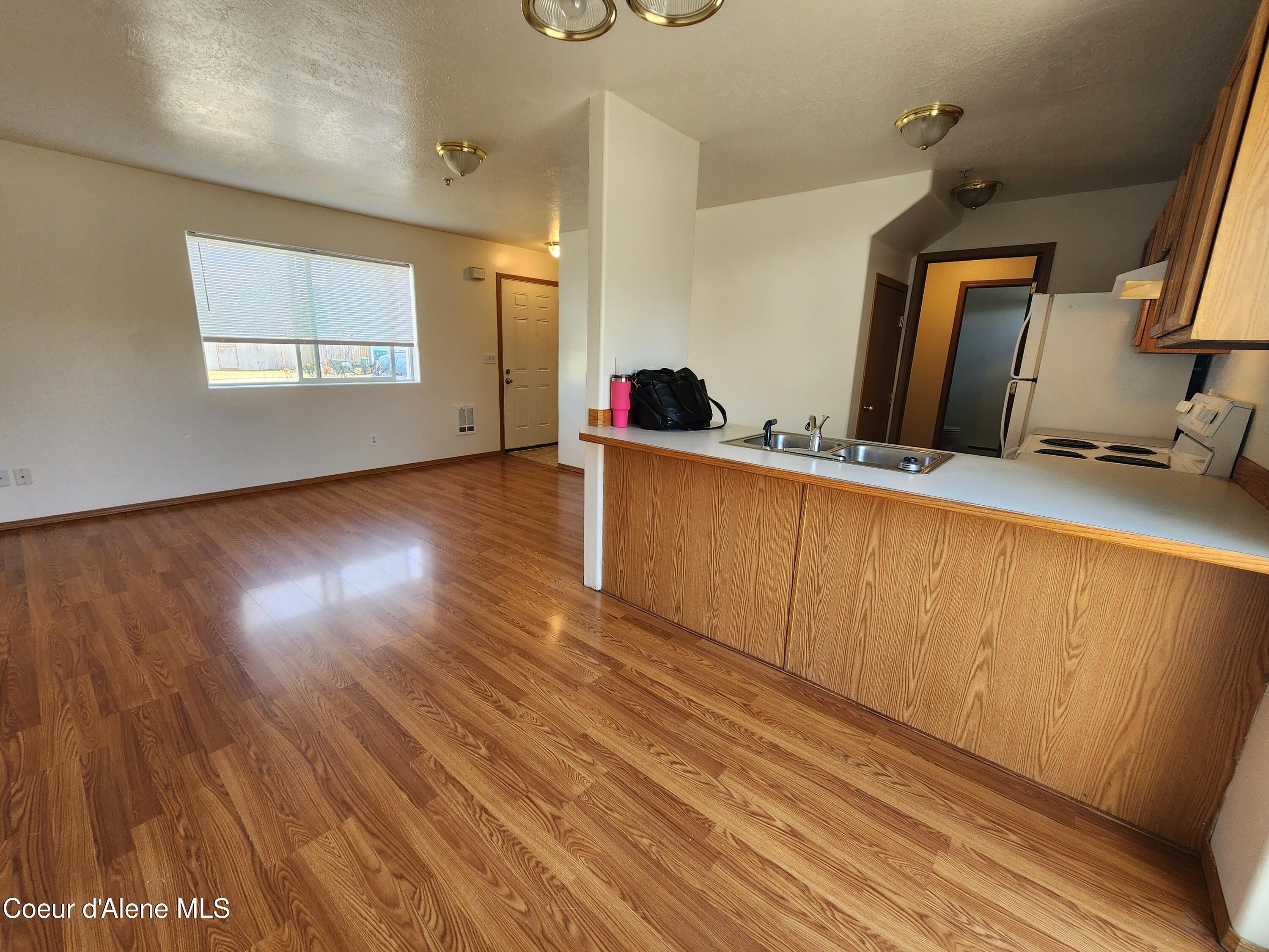 311 North Handy Street Post Falls, ID 83854 - Photo 6 of 15 Kitchen Dining Living