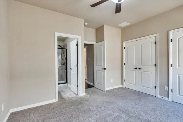 a view of a hallway with closet area
