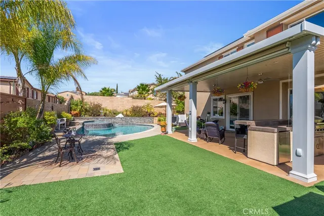a view of a backyard with a patio