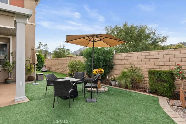 a garden view with a seating space