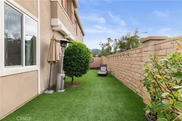a view of a back yard of the house