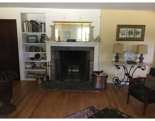 770 Watson Spruce Corner Road Ashfield, MA 01330 - Photo 8 of 30 a living room with furniture and a fireplace