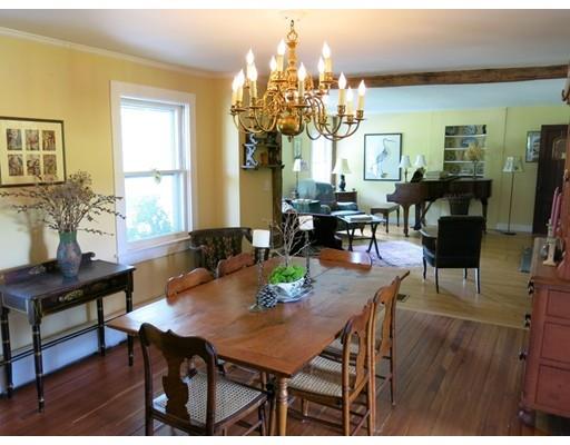 770 Watson Spruce Corner Road Ashfield, MA 01330 - Photo 10 of 30 a view of a dining room with furniture and wooden floor