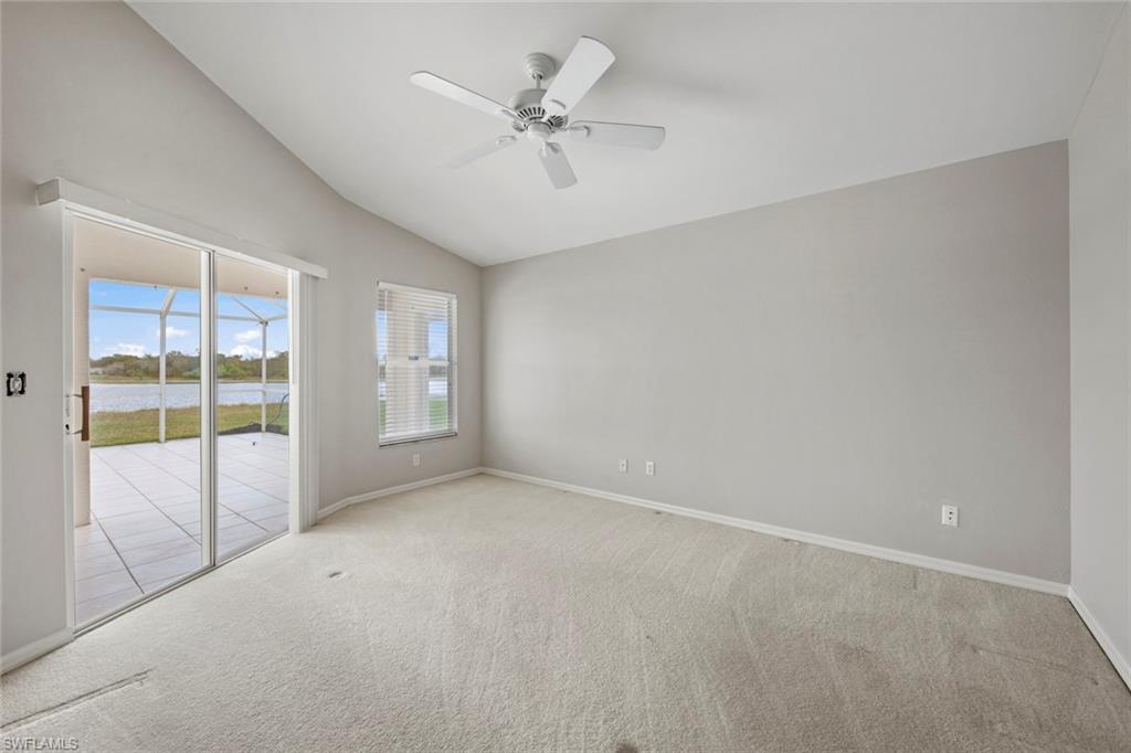 21629 Windham Run Estero, FL 33928 - Photo 13 of 48 a view of an empty room with a window
