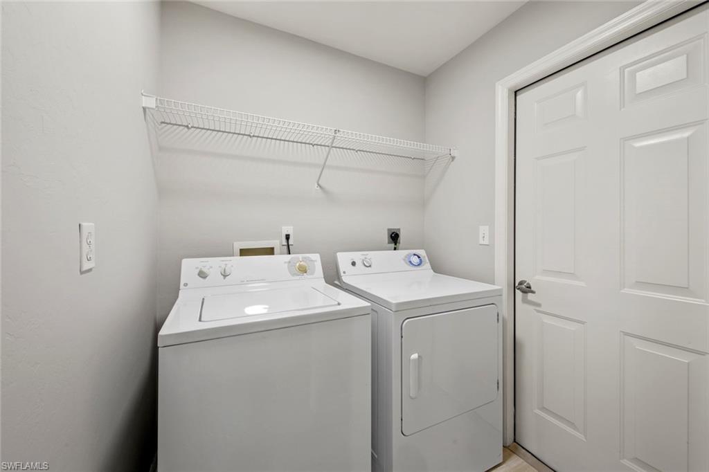 21629 Windham Run Estero, FL 33928 - Photo 27 of 48 a utility room with dryer and washer