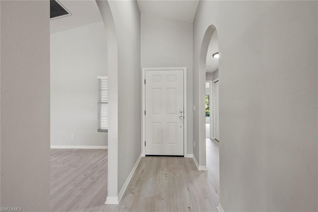 21629 Windham Run Estero, FL 33928 - Photo 28 of 48 wooden floor in a gallery