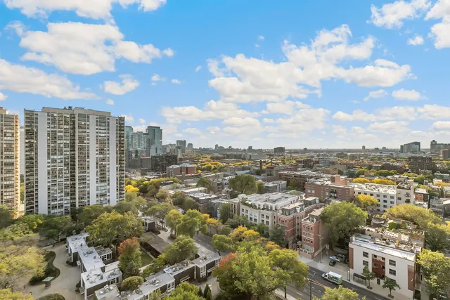 a view of a city with tall buildings