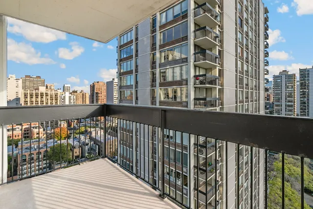 a view of buildings from the balcony