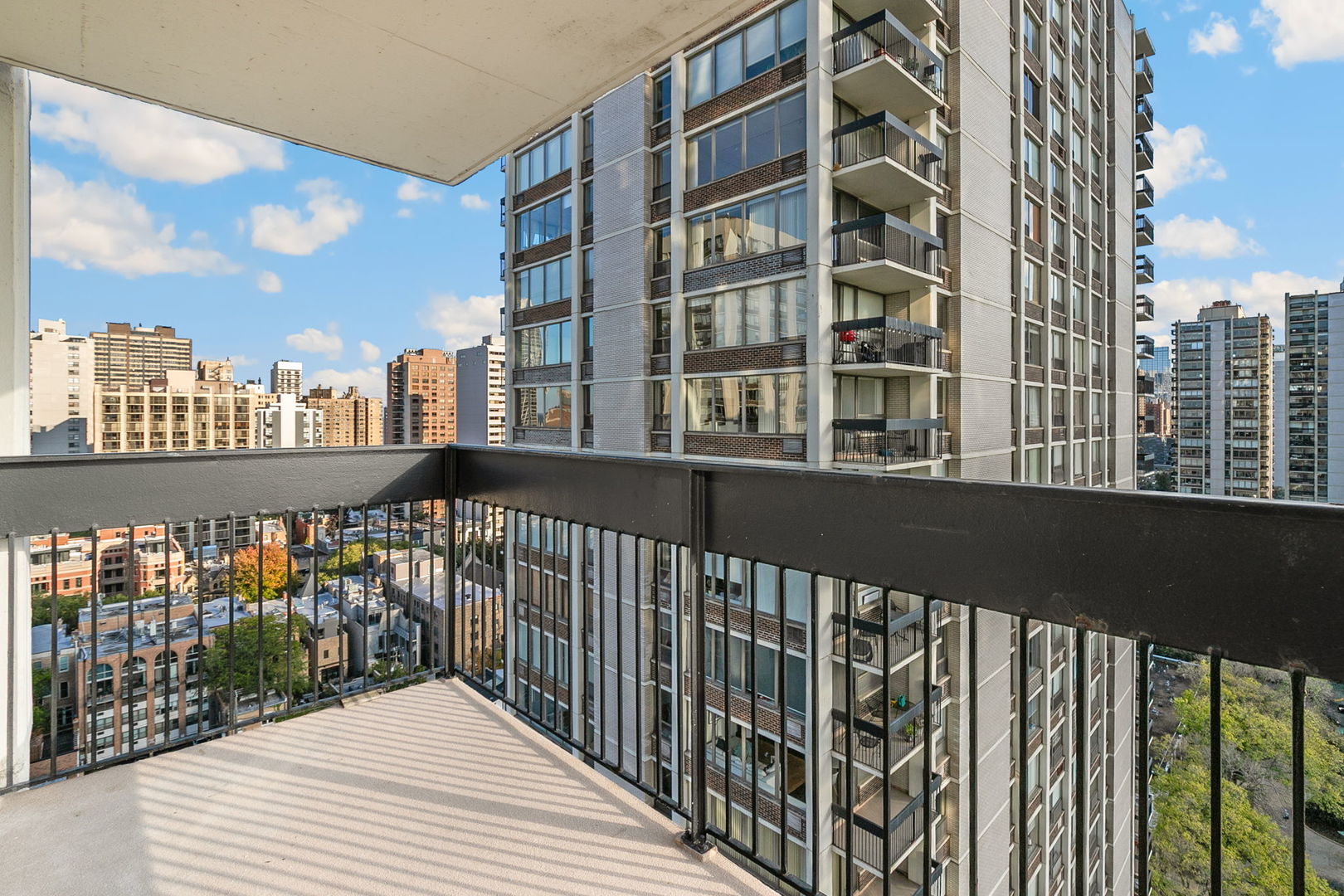 1460 North Sandburg Terrace, Unit 2001A Chicago, IL 60610 - Photo 26 of 39 a view of buildings from the balcony