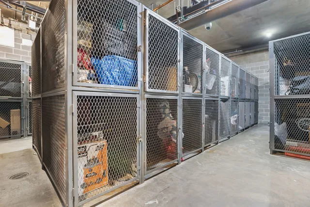 a view of a garage with cars