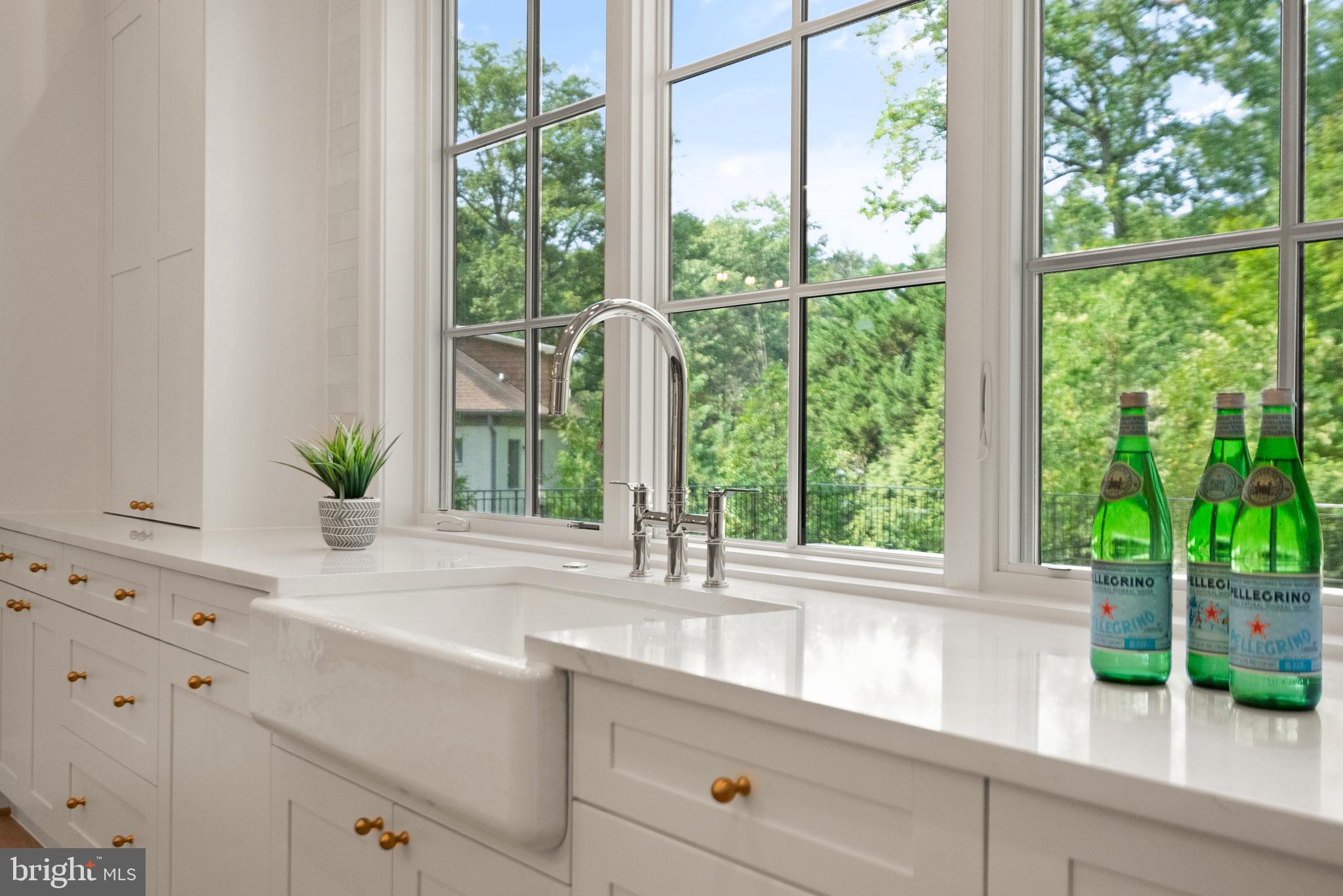 1104 Sharon Court McLean, VA 22101 - Photo 10 of 27 a kitchen with a large window and sink