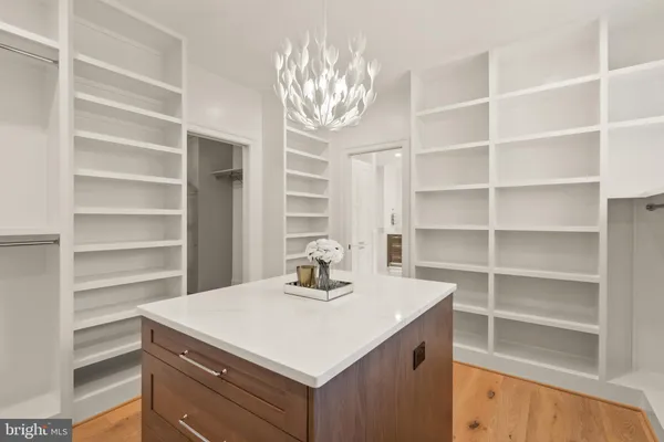 a bathroom with double sink and a mirror