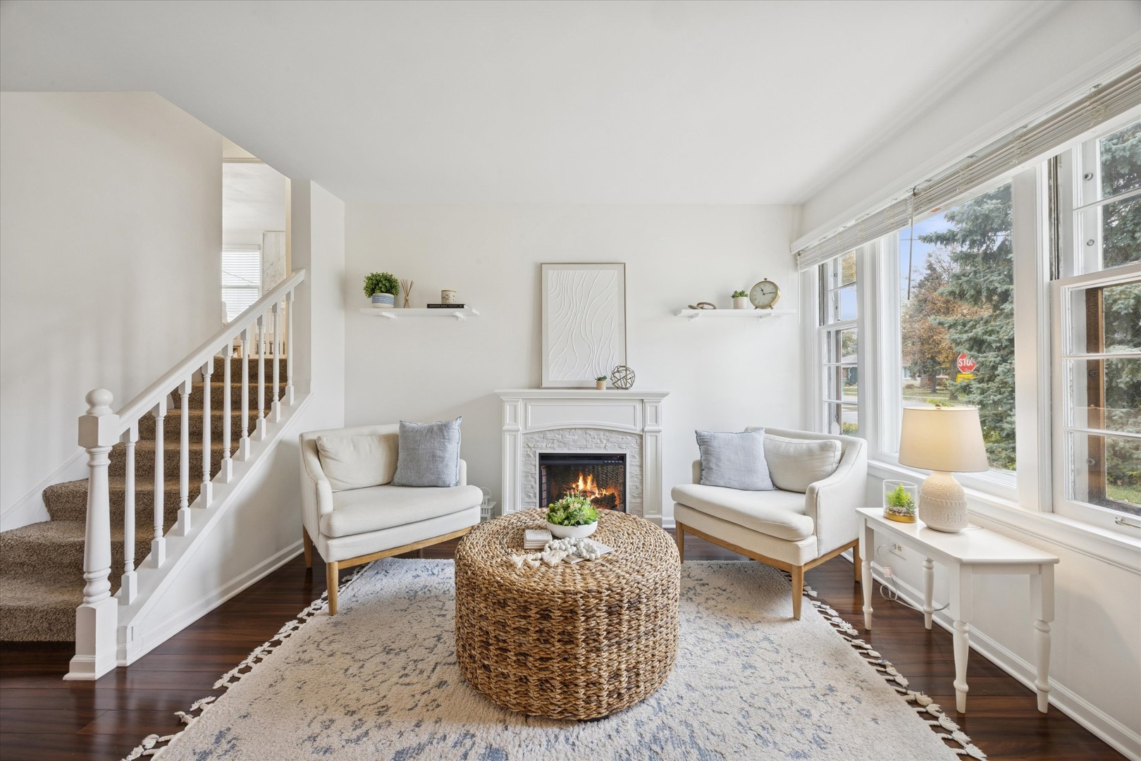 601 Homestead Road La Grange Park, IL 60526 - Photo 7 of 29 a living room with furniture fireplace and a large window