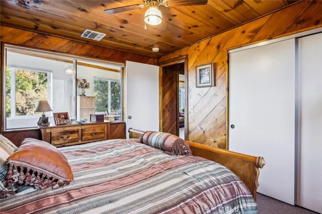 a view of a patio with table and chairs and potted plants