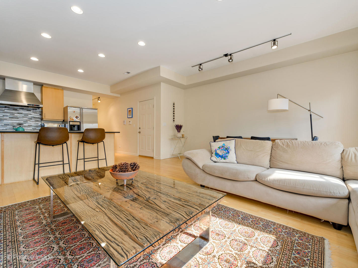 1829 North Mohawk Street, Unit 2N Chicago, IL 60614 - Photo 5 of 16 a living room with furniture and a rug