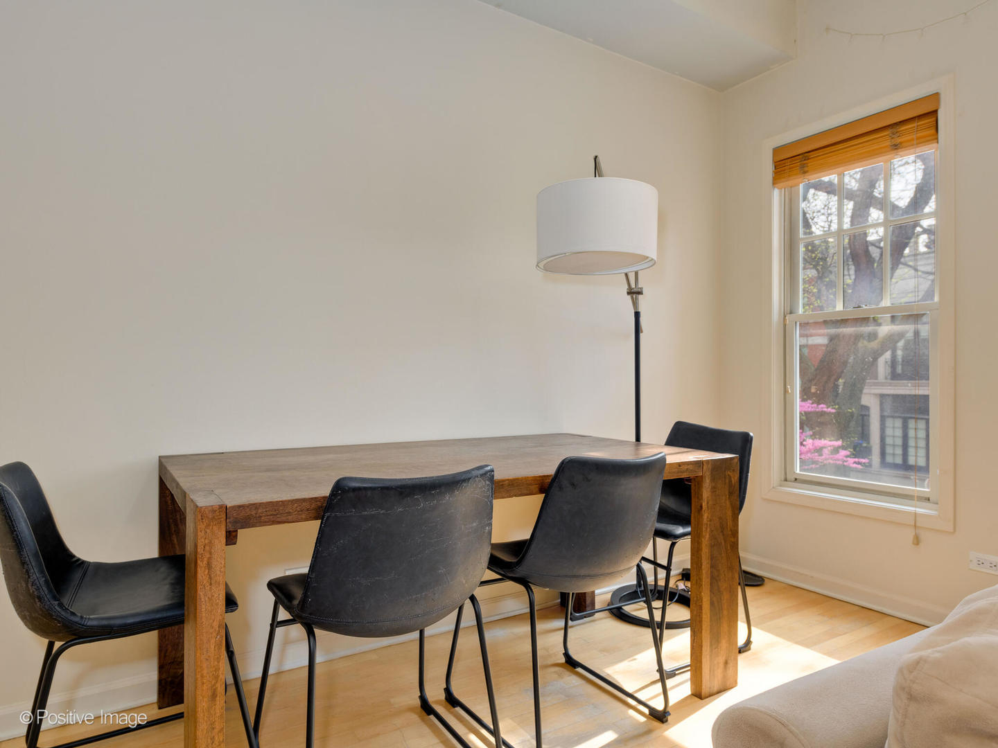 1829 North Mohawk Street, Unit 2N Chicago, IL 60614 - Photo 6 of 16 a view of a dining room with furniture and a window