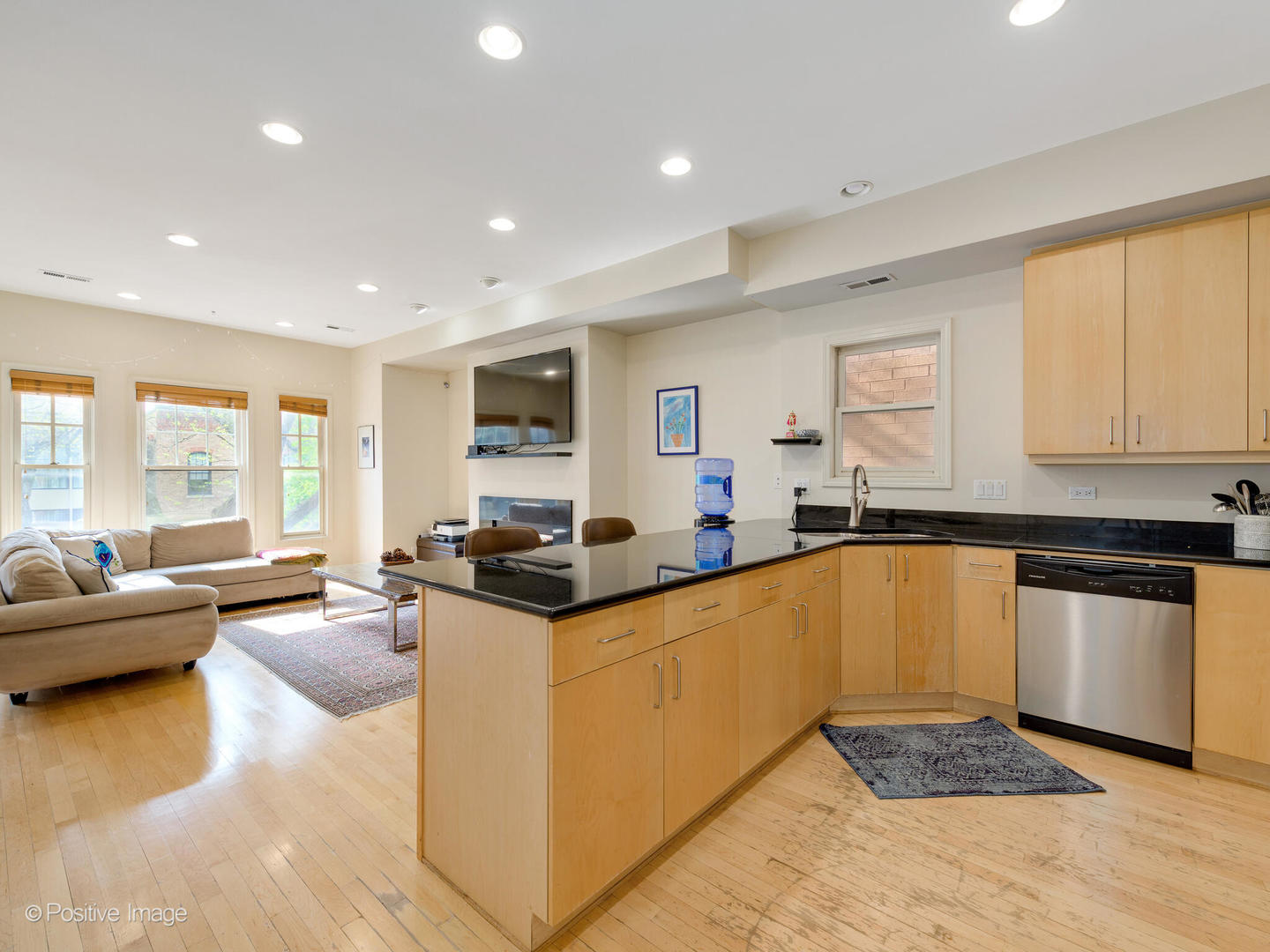 1829 North Mohawk Street, Unit 2N Chicago, IL 60614 - Photo 8 of 16 a kitchen with stainless steel appliances granite countertop a sink and cabinets