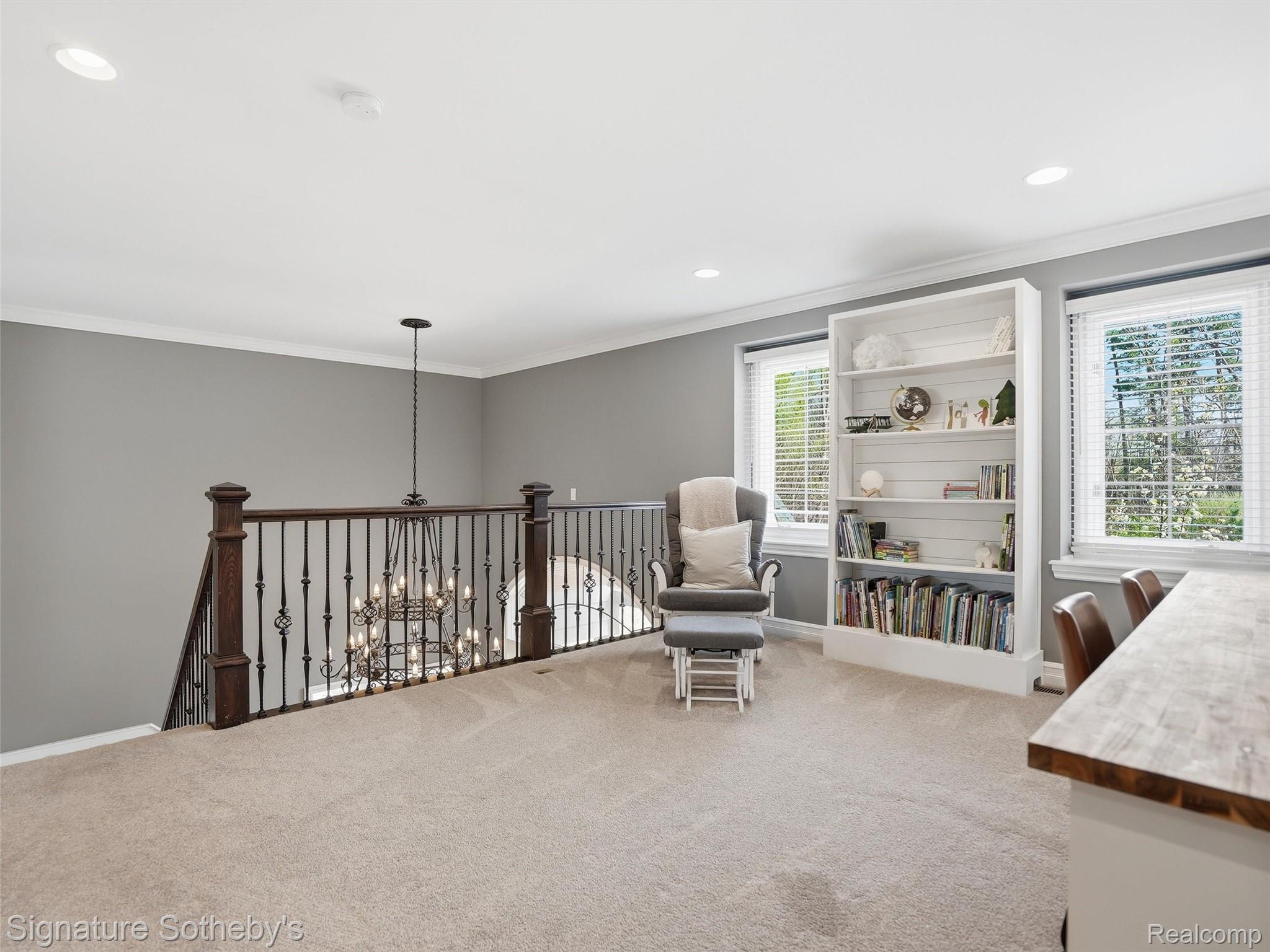 1595 Carriage Way Rochester, MI 48307 - Photo 65 of 78 Living area featuring crown molding, carpet, and recessed lighting