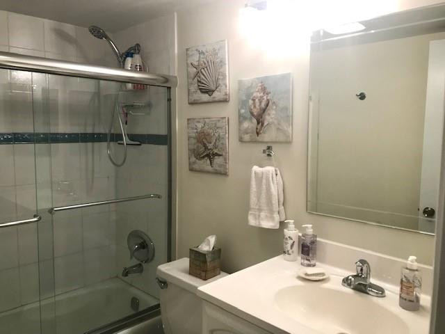 257 South Cypress Road, Unit 423 Pompano Beach, FL 33060 - Photo 20 of 38 a bathroom with a sink and mirror