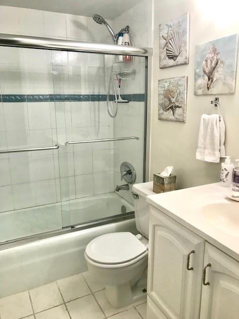 257 South Cypress Road, Unit 423 Pompano Beach, FL 33060 - Photo 21 of 38 a bathroom with a toilet a sink and shower